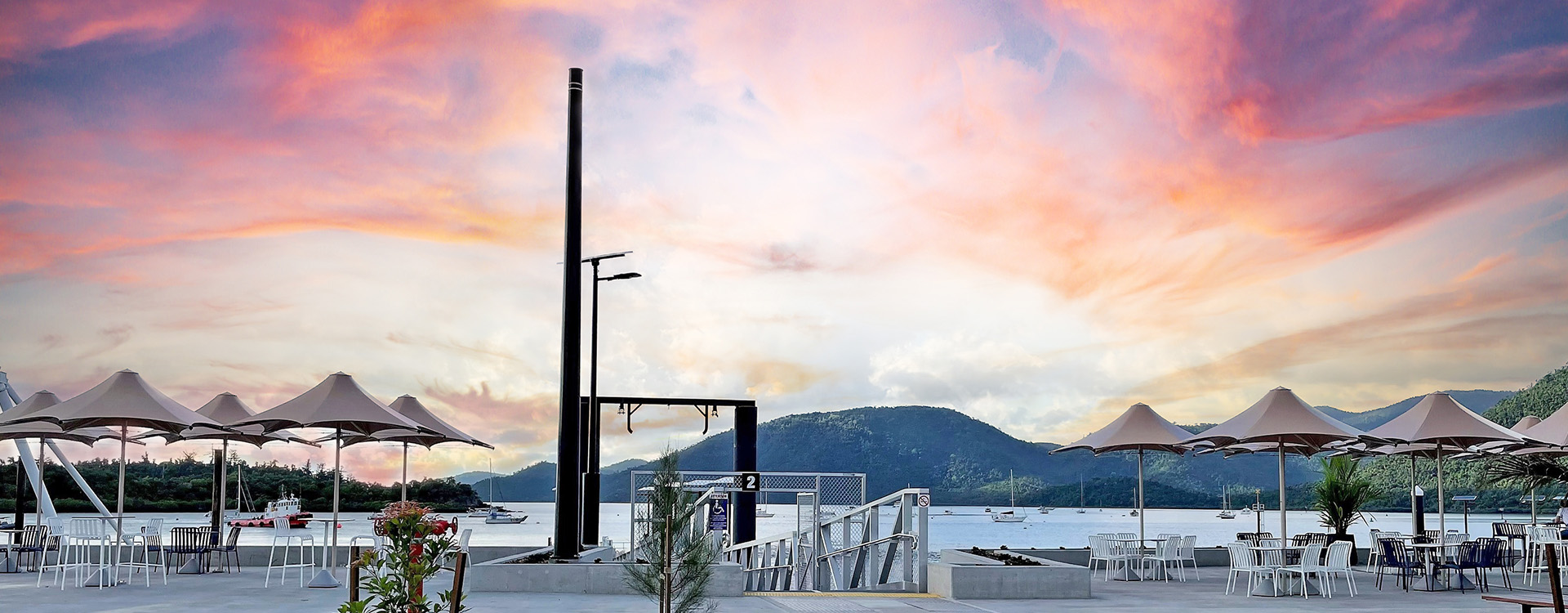 Shute Harbour Marina at Sunset with MakMax Umbrellas